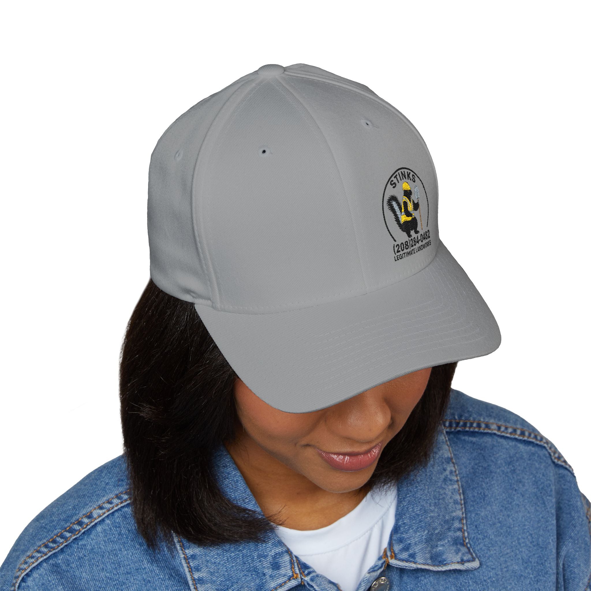 Embroidered 'Stinks' Skunk Logo Cap — White Structured Baseball Hat